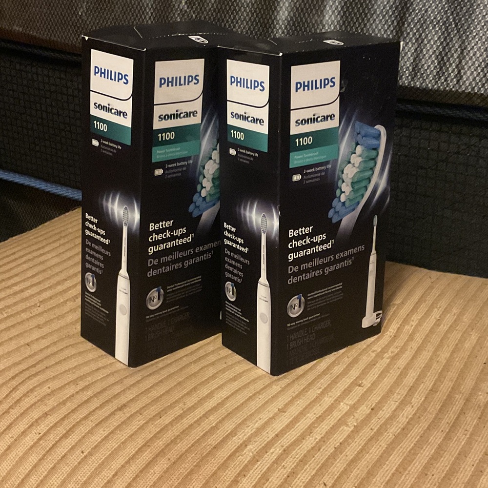 Philips Sonicare 1100 Electric Toothbrush in Black and White